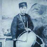Historic photograph of drummer boy in a military uniform